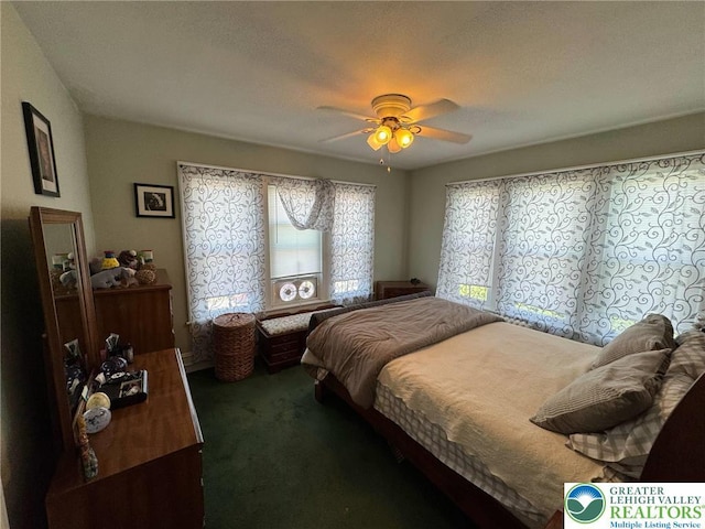 bedroom featuring carpet floors and ceiling fan