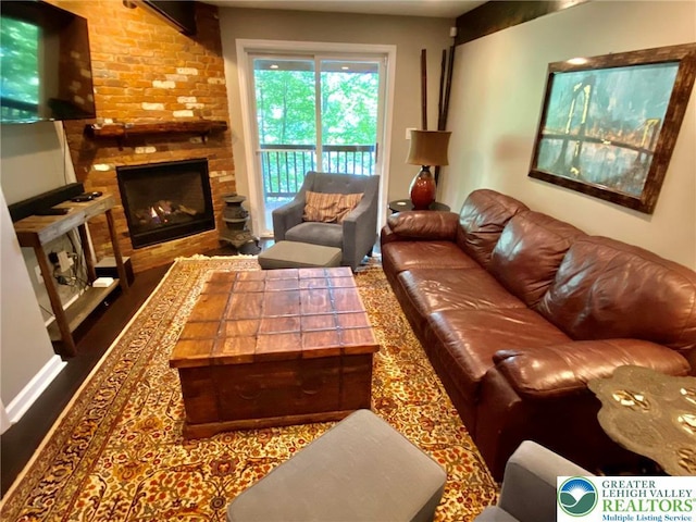 living room featuring a fireplace