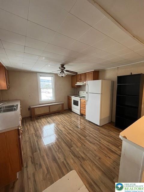 416 E Union St Unit 1 & 2, Tamaqua Borough, PA 18252 - kitchen featuring white appliances, a sink, brown cabinets, dark wood-style flooring, and a ceiling fan