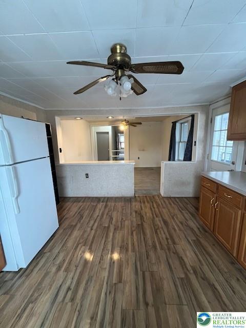 416 E Union St Unit 1 & 2, Tamaqua Borough, PA 18252 - kitchen with freestanding refrigerator, ceiling fan, brown cabinets, dark wood finished floors, and light countertops