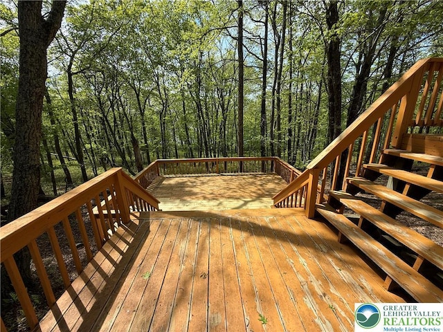 deck featuring stairs