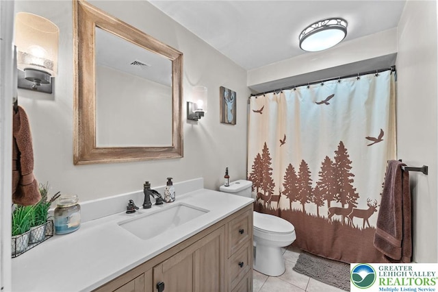 full bath featuring tile patterned floors, toilet, vanity, and a shower with shower curtain