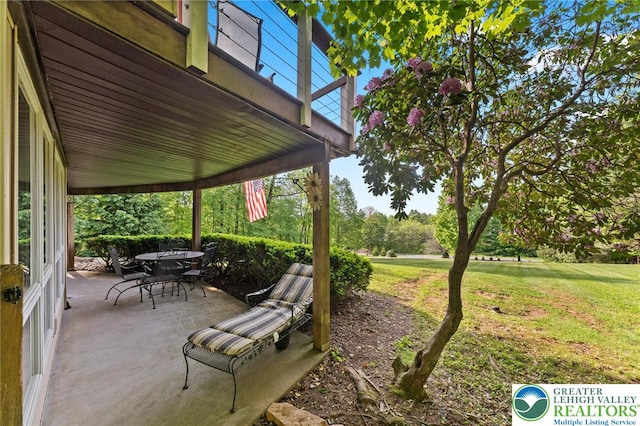 view of patio with outdoor dining space