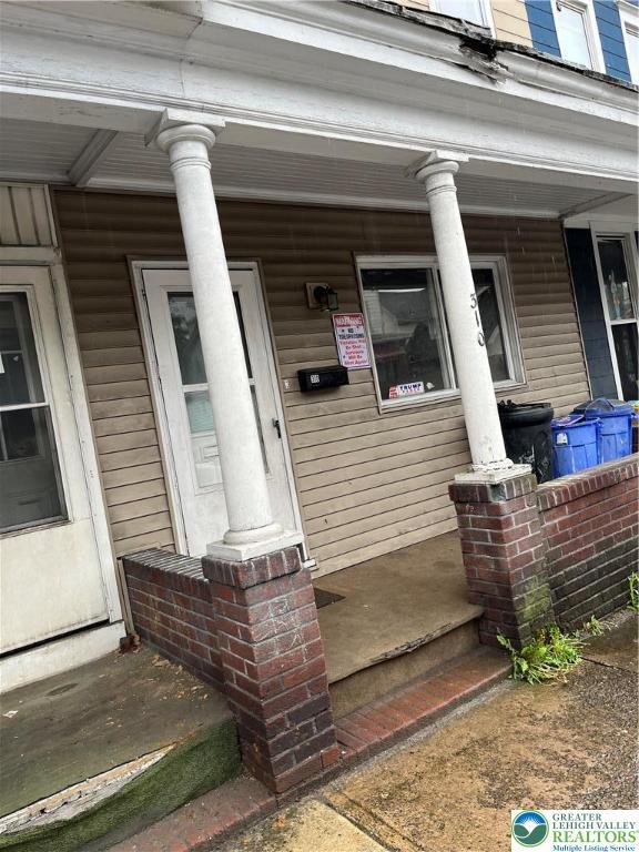 310 E Broad St, Tamaqua Borough, PA 18252 - doorway to property with covered porch