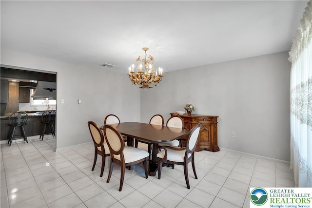 dining room featuring a chandelier