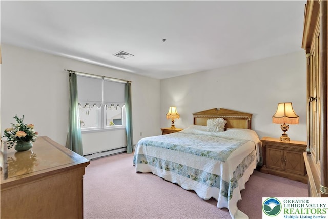 bedroom featuring a baseboard heating unit and light carpet