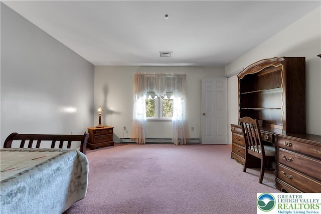 carpeted bedroom featuring an office area