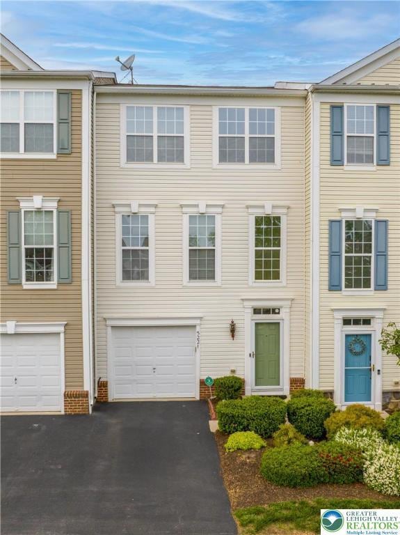 5221 Chandler Way S, Whitehall Twp, PA 18069 - view of property featuring asphalt driveway and a garage