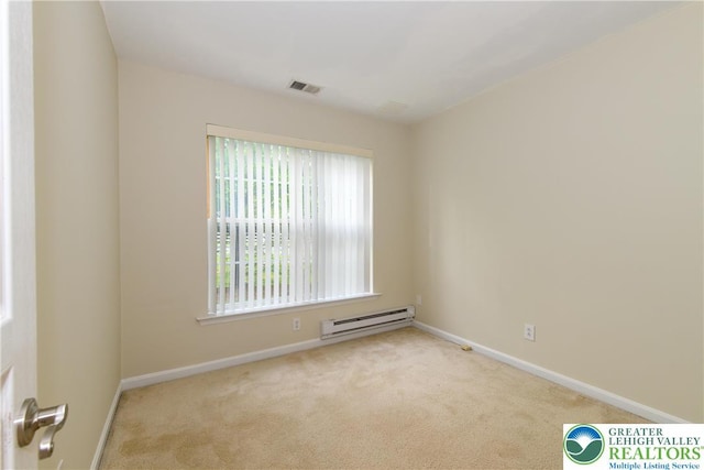 5221 Chandler Way S, Whitehall Twp, PA 18069 - spare room featuring a baseboard radiator, carpet floors, and baseboards