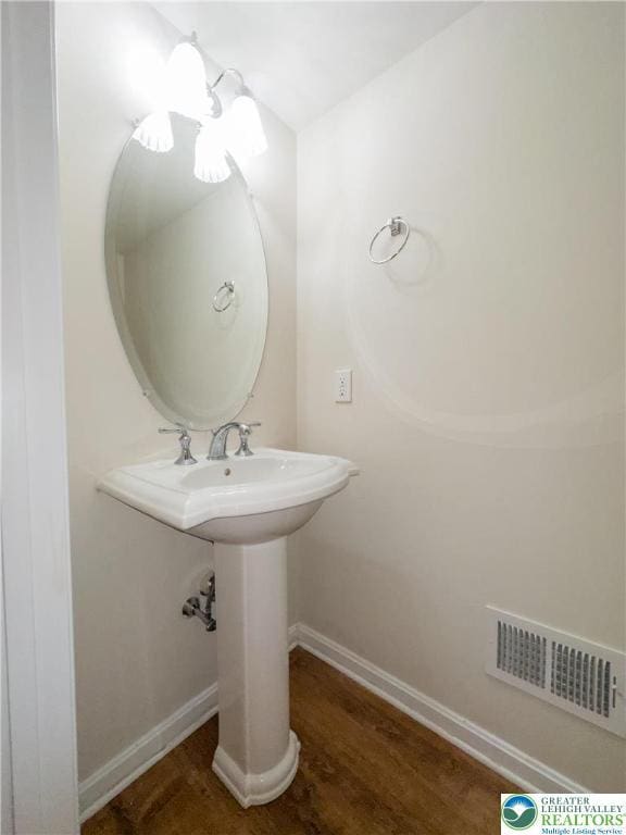 5221 Chandler Way S, Whitehall Twp, PA 18069 - bathroom with wood finished floors and baseboards