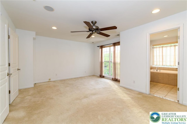 5221 Chandler Way S, Whitehall Twp, PA 18069 - unfurnished bedroom featuring light carpet, recessed lighting, baseboards, connected bathroom, and ceiling fan