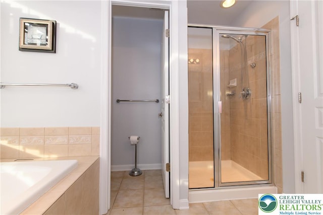 5221 Chandler Way S, Whitehall Twp, PA 18069 - full bathroom featuring a stall shower, tile patterned floors, a garden tub, and baseboards