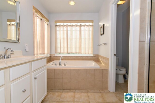 5221 Chandler Way S, Whitehall Twp, PA 18069 - bathroom with tile patterned flooring, a bath, vanity, and toilet