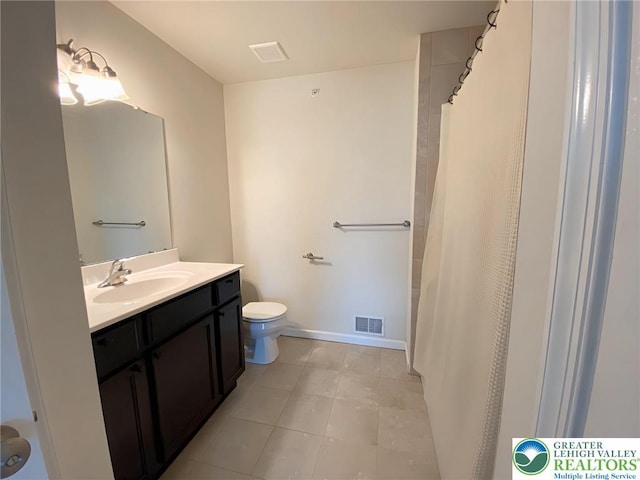 306 Redclover Ln, Upper Macungie Twp, PA 18104 - full bathroom with toilet, vanity, tile patterned flooring, and baseboards