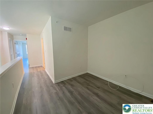 306 Redclover Ln, Upper Macungie Twp, PA 18104 - empty room with dark wood finished floors and baseboards