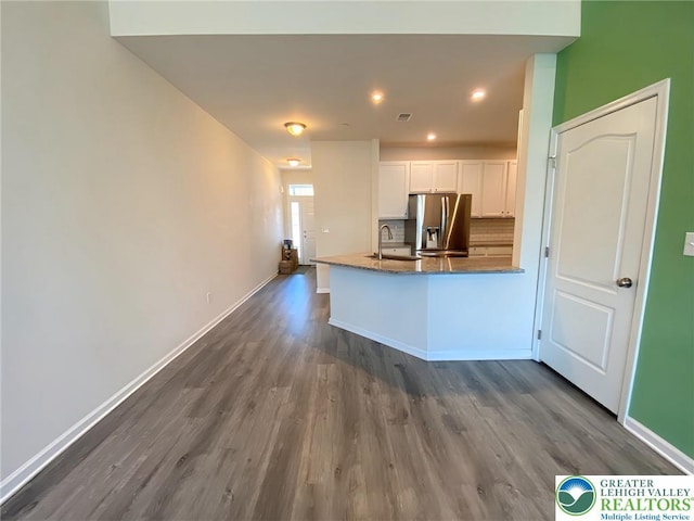 306 Redclover Ln, Upper Macungie Twp, PA 18104 - kitchen with stainless steel fridge with ice dispenser, a sink, dark wood-style floors, white cabinets, and baseboards