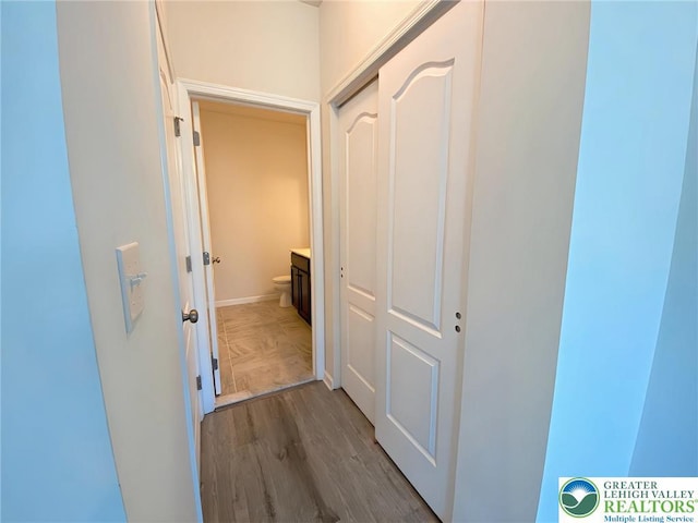306 Redclover Ln, Upper Macungie Twp, PA 18104 - corridor with wood finished floors and baseboards