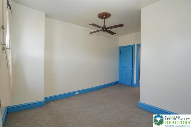 415 Hazle St, Tamaqua Borough, PA 18252 - spare room featuring ceiling fan, carpet floors, and baseboards