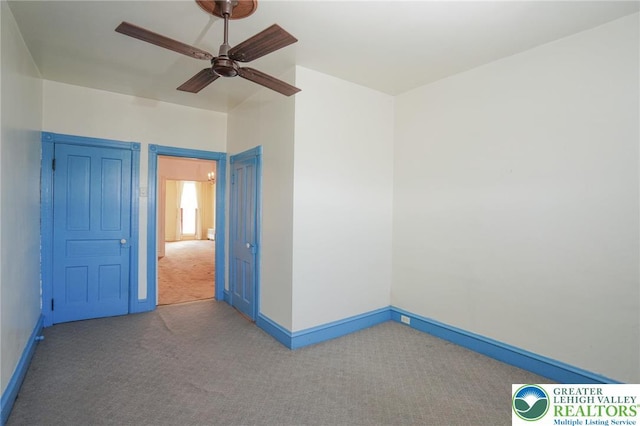415 Hazle St, Tamaqua Borough, PA 18252 - spare room featuring carpet flooring, a ceiling fan, and baseboards