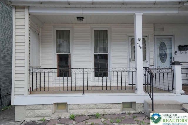 415 Hazle St, Tamaqua Borough, PA 18252 - doorway to property featuring a porch