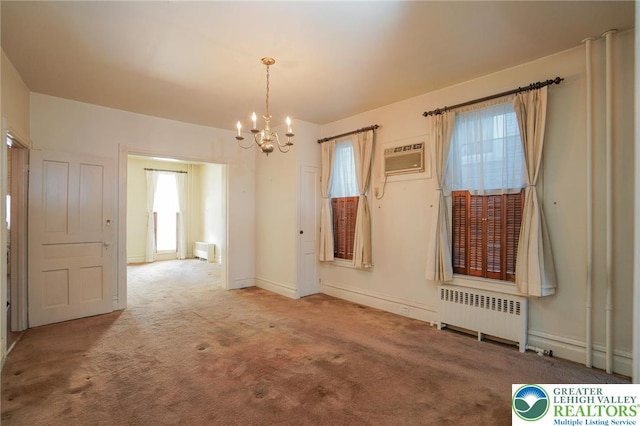 415 Hazle St, Tamaqua Borough, PA 18252 - unfurnished dining area featuring radiator heating unit, a chandelier, carpet flooring, baseboards, and a wall mounted AC