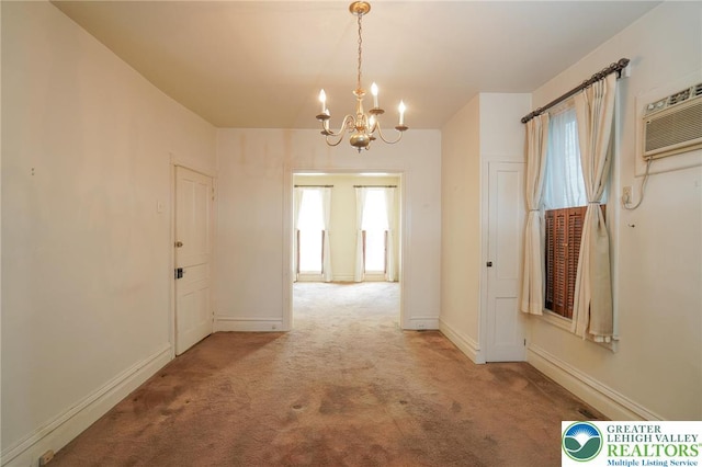 415 Hazle St, Tamaqua Borough, PA 18252 - hall with a chandelier, light colored carpet, and healthy amount of natural light