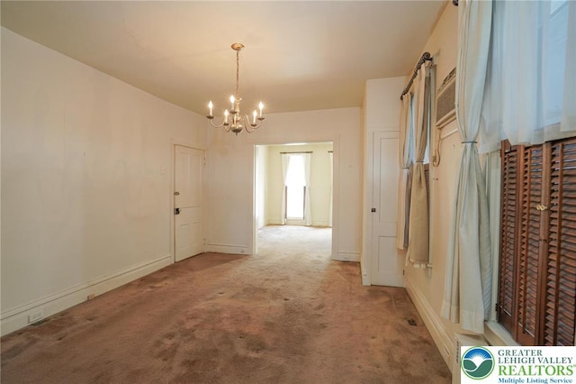 415 Hazle St, Tamaqua Borough, PA 18252 - unfurnished dining area with a chandelier, light colored carpet, and baseboards