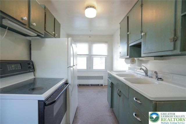 415 Hazle St, Tamaqua Borough, PA 18252 - kitchen featuring radiator heating unit, electric stove, a sink, carpet flooring, and light countertops
