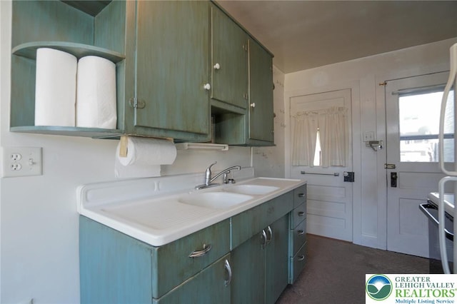415 Hazle St, Tamaqua Borough, PA 18252 - kitchen featuring light countertops, a sink, and range