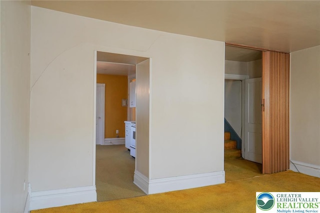 415 Hazle St, Tamaqua Borough, PA 18252 - empty room featuring light colored carpet and stairs