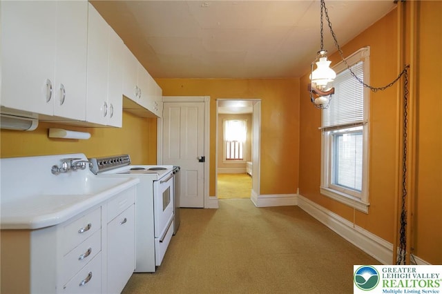 415 Hazle St, Tamaqua Borough, PA 18252 - laundry room featuring washer and dryer, light colored carpet, cabinet space, and baseboards