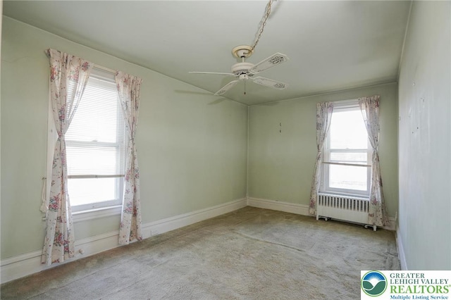 415 Hazle St, Tamaqua Borough, PA 18252 - carpeted empty room featuring radiator heating unit, baseboards, and a ceiling fan