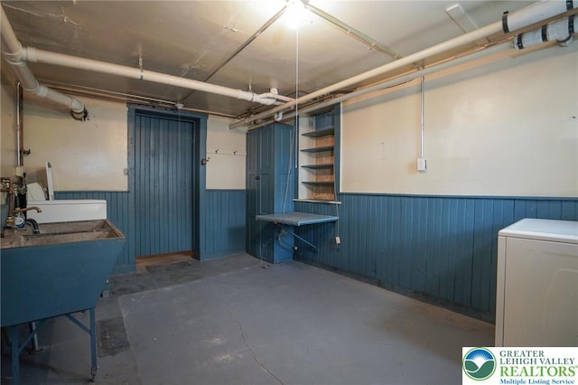 415 Hazle St, Tamaqua Borough, PA 18252 - below grade area with wainscoting, washer / clothes dryer, and wood walls