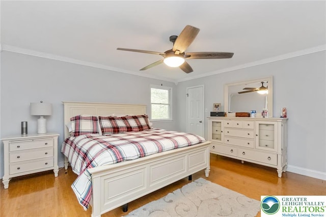 bedroom featuring light wood-type flooring, ornamental molding, ceiling fan, and baseboards