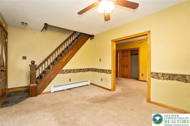 unfurnished living room with a baseboard radiator, carpet flooring, a ceiling fan, stairway, and a textured ceiling