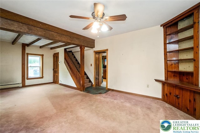 unfurnished living room with baseboard heating, carpet floors, stairway, a ceiling fan, and baseboards