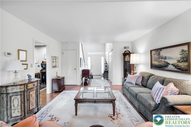 living area featuring wood finished floors
