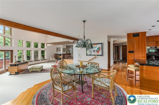 2342 Bobby Ct, South Whitehall Twp, PA 18069 - dining space with a chandelier, light wood-type flooring, and beamed ceiling