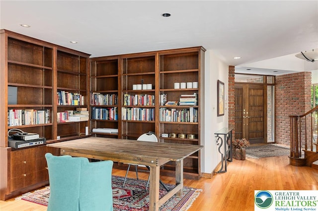2342 Bobby Ct, South Whitehall Twp, PA 18069 - office with light wood-style floors, brick wall, and recessed lighting