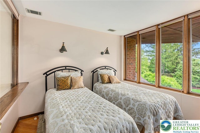 2342 Bobby Ct, South Whitehall Twp, PA 18069 - bedroom with wood finished floors and baseboards