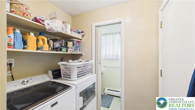 4168 Orefield Rd, South Whitehall Twp, PA 18104 - laundry area with washer and dryer and a baseboard heating unit