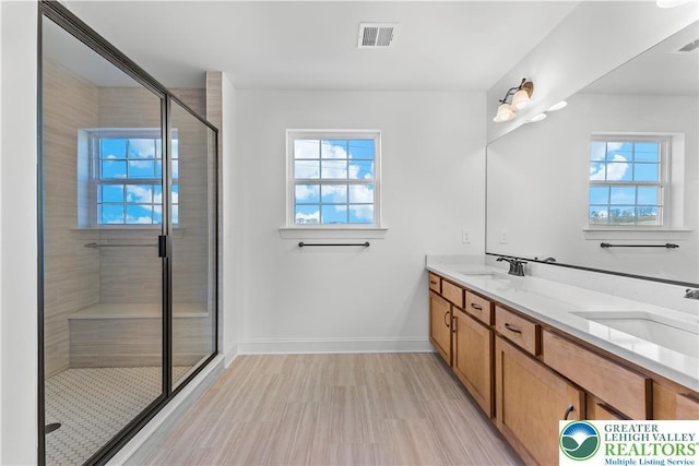 4779 Farrcroft Dr Unit 90, Forks Twp, PA 18040 - full bathroom featuring double vanity, baseboards, healthy amount of natural light, and a shower stall
