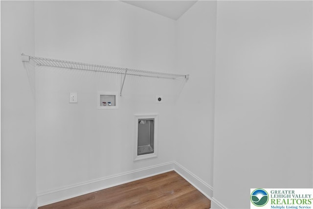 4779 Farrcroft Dr Unit 90, Forks Twp, PA 18040 - laundry room with electric dryer hookup, washer hookup, wood finished floors, and baseboards