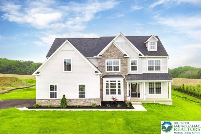 4779 Farrcroft Dr Unit 90, Forks Twp, PA 18040 - view of front of property with stone siding, board and batten siding, and roof with shingles