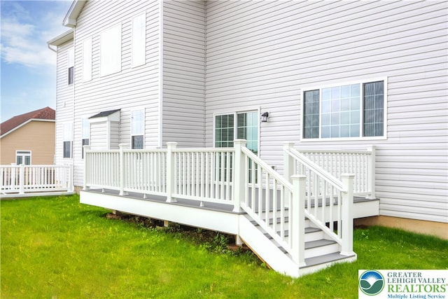 4779 Farrcroft Dr Unit 90, Forks Twp, PA 18040 - rear view of property with a wooden deck and a yard