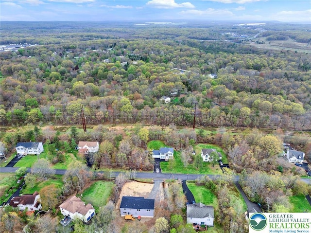 959 Cricket, Tunkhannock Township, PA 18334 - aerial view of property and surrounding area featuring a forest