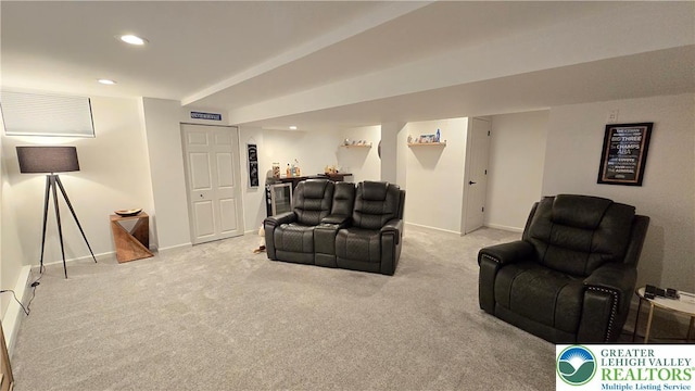 carpeted living room with baseboards and recessed lighting