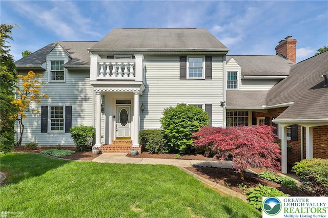 1551 Wethersfield Dr, South Whitehall Twp, PA 18104 - view of front of property featuring a front lawn and a balcony