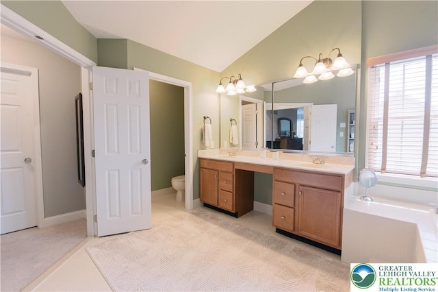 full bath with double vanity, toilet, plenty of natural light, a bath, and lofted ceiling
