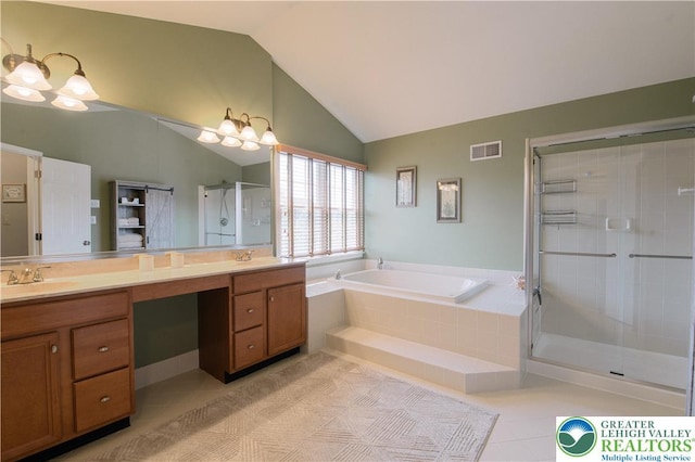 bathroom featuring tile patterned flooring, a shower stall, a garden tub, double vanity, and lofted ceiling